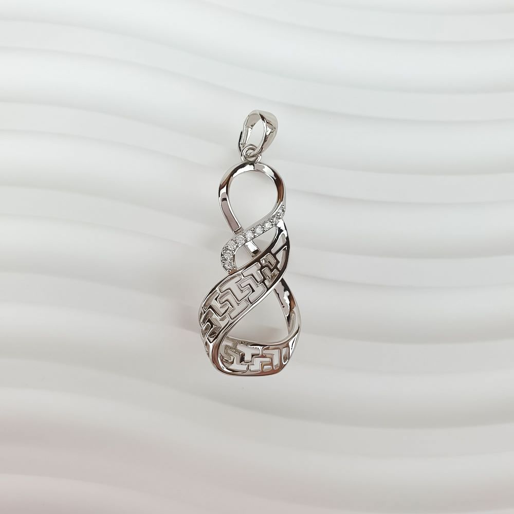 Platinum-plated infinity pendant at an angle, showing the Greek ornament and loop