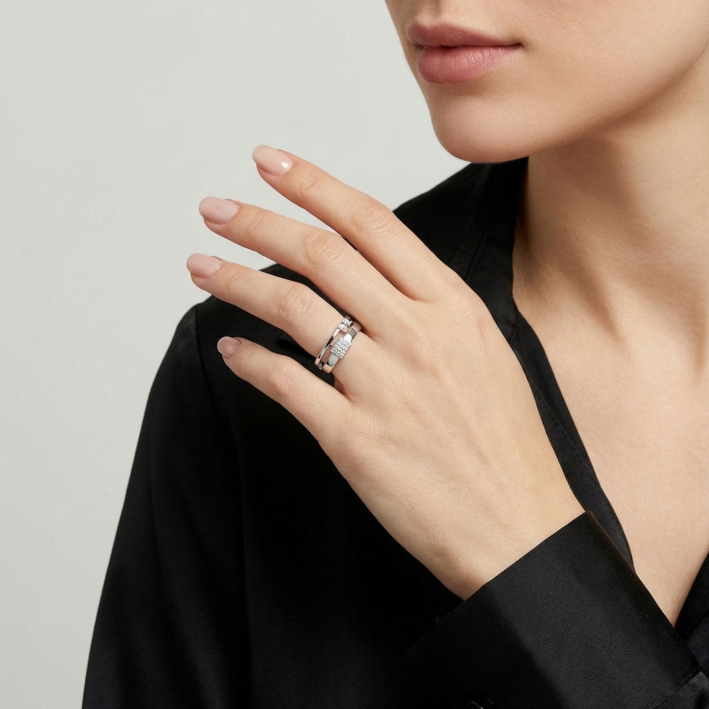 Model in a black blouse wearing the geometric ring with a stone rectangle