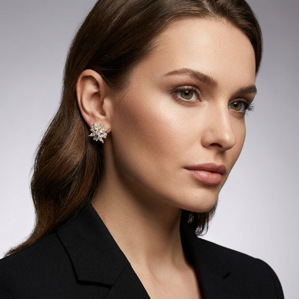 Model in a black blazer wearing a star-shaped earring with clear stones
