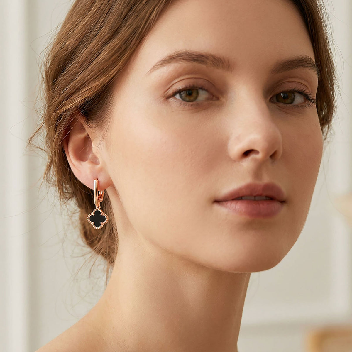 Black enamel clover earrings with leverback clasps