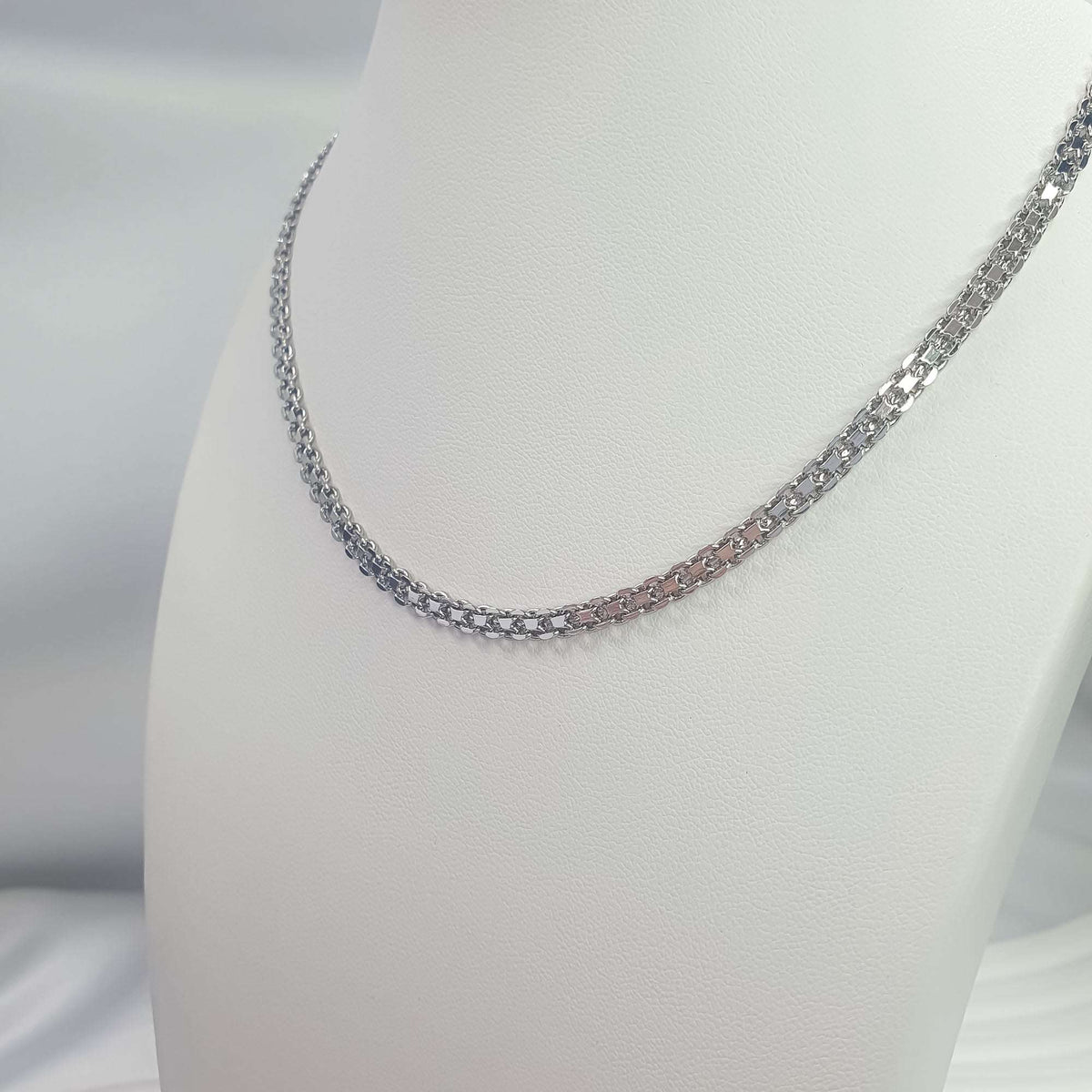 Silver-tone Bismarck chain on a mannequin neck