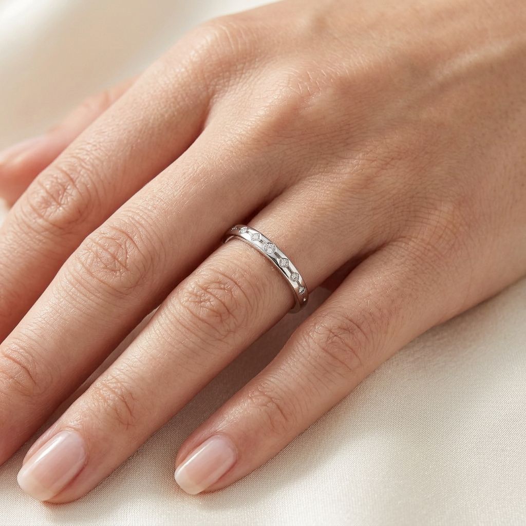 Slim cubic zirconia ring on a woman's finger in everyday wear