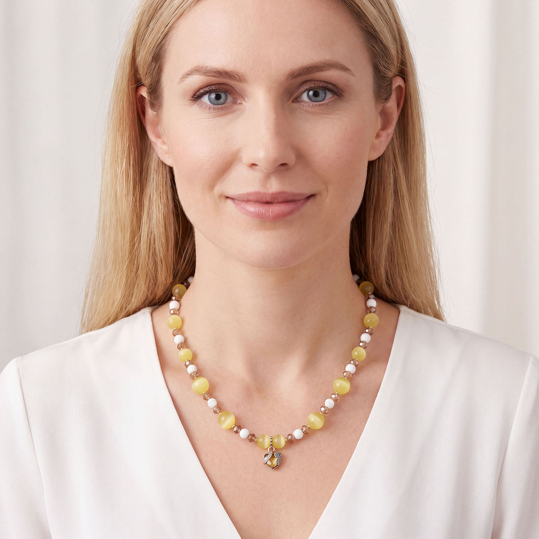 Women's bead necklace with white stones, honey crystals and yellow beads
