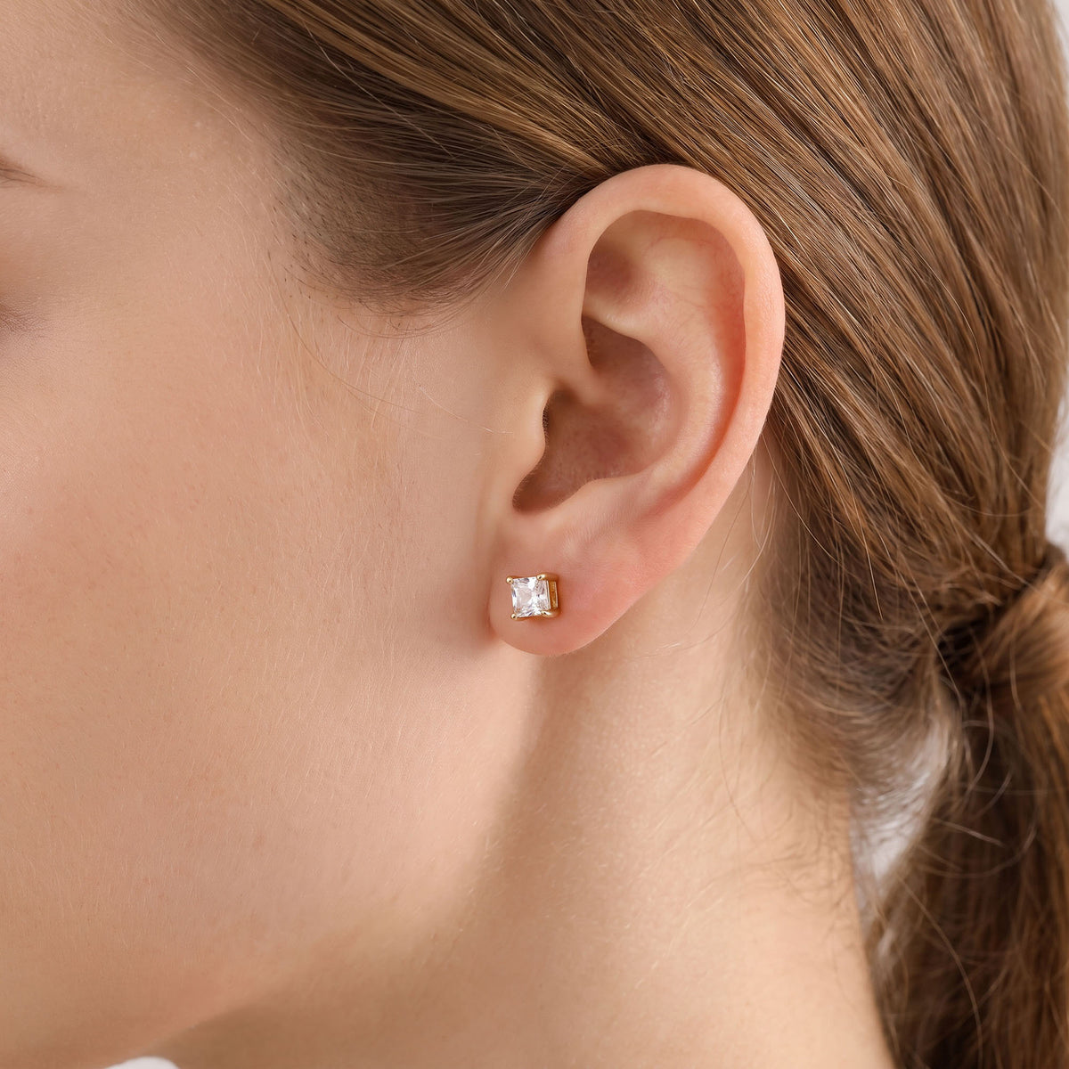 White | Gold-tone studs with a clear crystal and push-back fastening
