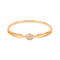 Gold-tone bangle with a cubic zirconia pavé oval at the centre