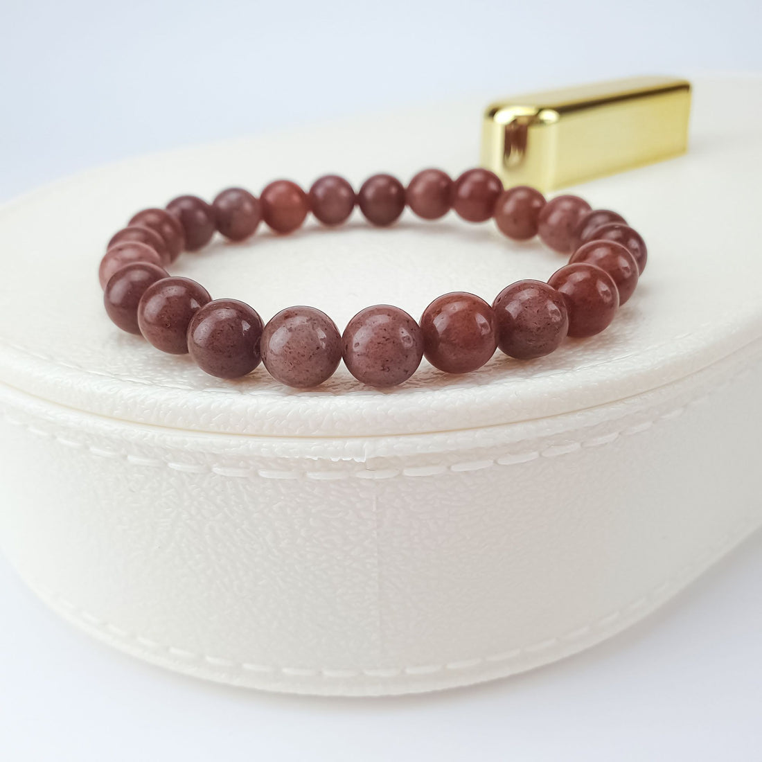 Aventurine bead bracelet at an angle on a white jewellery box
