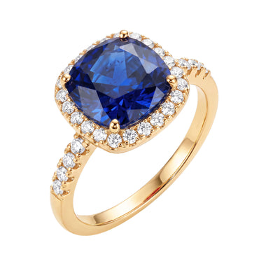 Blue cushion halo ring with side stones