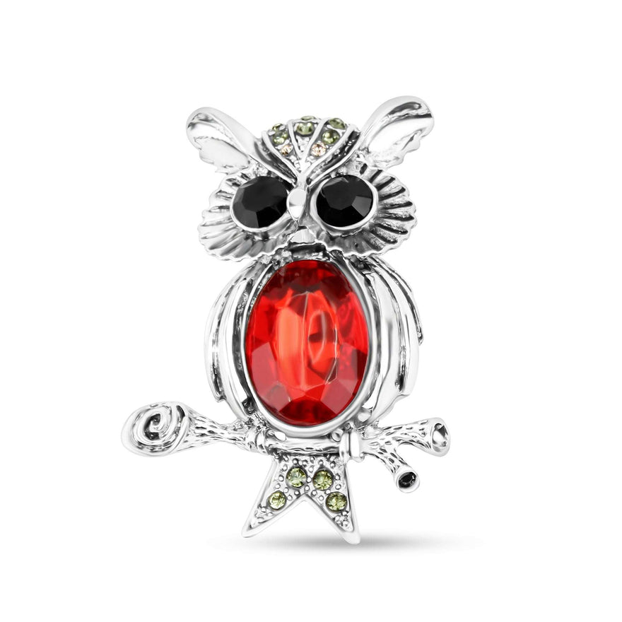 Owl brooch with a large red stone