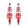 Long silver-tone earrings with red crystals and a long marquise-shaped stone