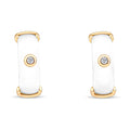 Gold-plated earrings with a wide white ceramic band and one bright cubic zirconia