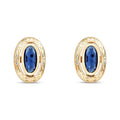 Oval gold-plated earrings with a blue stone, engraving and white side stones