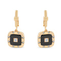 Gold-plated square earrings with black ceramic and white cubic zirconia around the frame