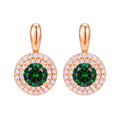 Pair of earrings with a round green stone and double halo of white stones