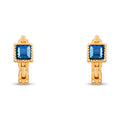 Close-up of gold-plated hoop earrings with a chain pattern and square navy stone
