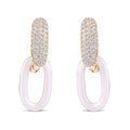 Gold-plated earrings with a cubic zirconia top and white ceramic oval drop
