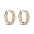 Gold-plated hoop earrings densely covered with clear cubic zirconia for a festive look