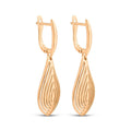 Long gold-plated earrings with a cut-out teardrop pattern and leverback clasp