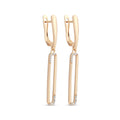 Long gold-plated oval drop earrings with cubic zirconia at the ends and leverback clasps