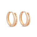 Gold-plated hoop earrings with an openwork Greek meander pattern on white