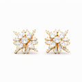 Pair of gold-plated star-shaped clip-on earrings with clear cubic zirconia