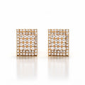 Rectangular gold-plated clip-on earrings with a dense clear cubic zirconia mosaic on white