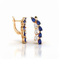 Pair of earrings with blue and white teardrop cubic zirconia and gold-plated leverbacks