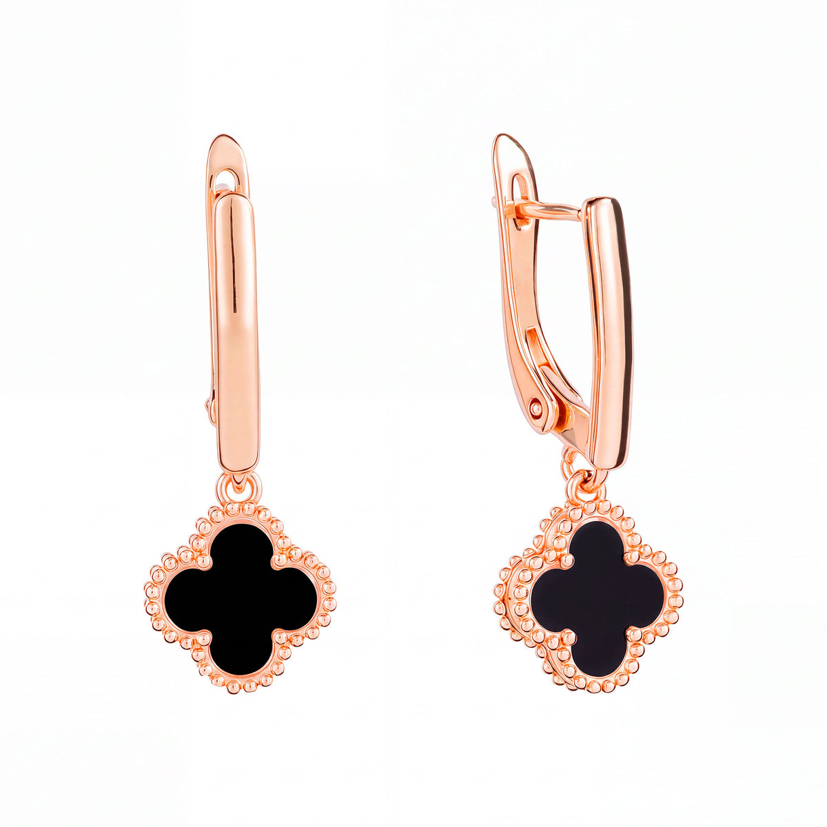 Long earrings with a black enamel clover in a beaded gold-tone rim, leverback clasp