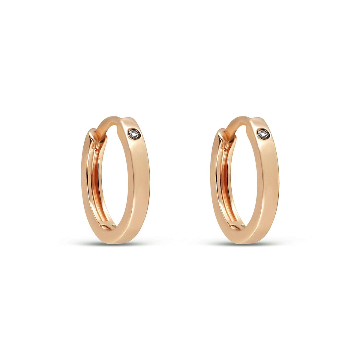 Small hoop earrings with a tiny clear cubic zirconia on white