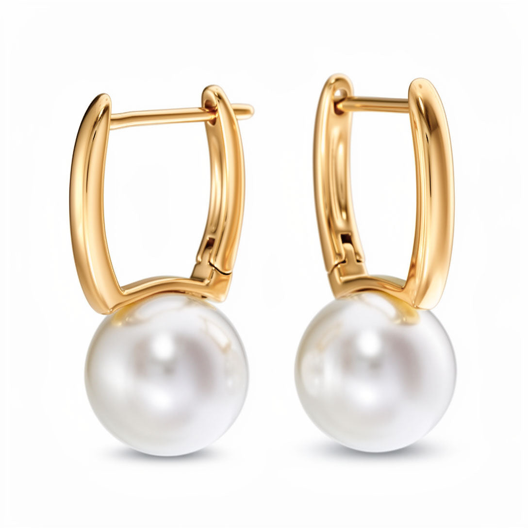 Gold-plated earrings with a large white faux pearl and leverback clasp