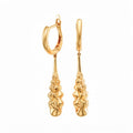 Pair of long gold-plated earrings with a textured drop and leverback clasp