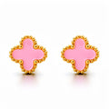 Pink enamel clover earrings with a beaded gold-tone rim, close-up on white