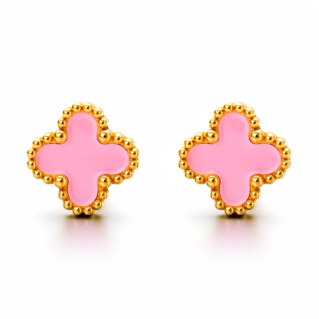 Pink enamel clover earrings with a beaded gold-tone rim, close-up on white