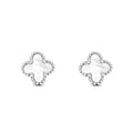 White four-leaf clover studs with a silver-tone beaded rim on a white background