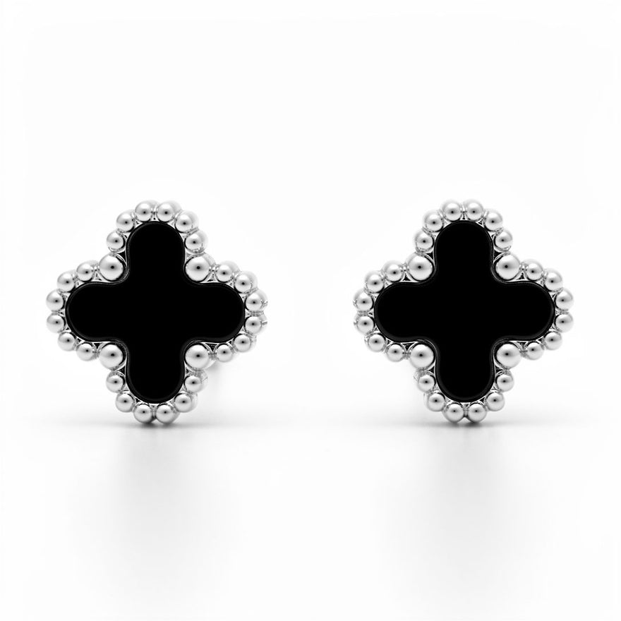 Black and silver-tone clover studs