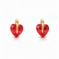 Red heart-shaped cubic zirconia in gold-tone settings on a white background