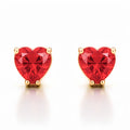 Red heart cubic zirconia studs in gold-plated claw settings