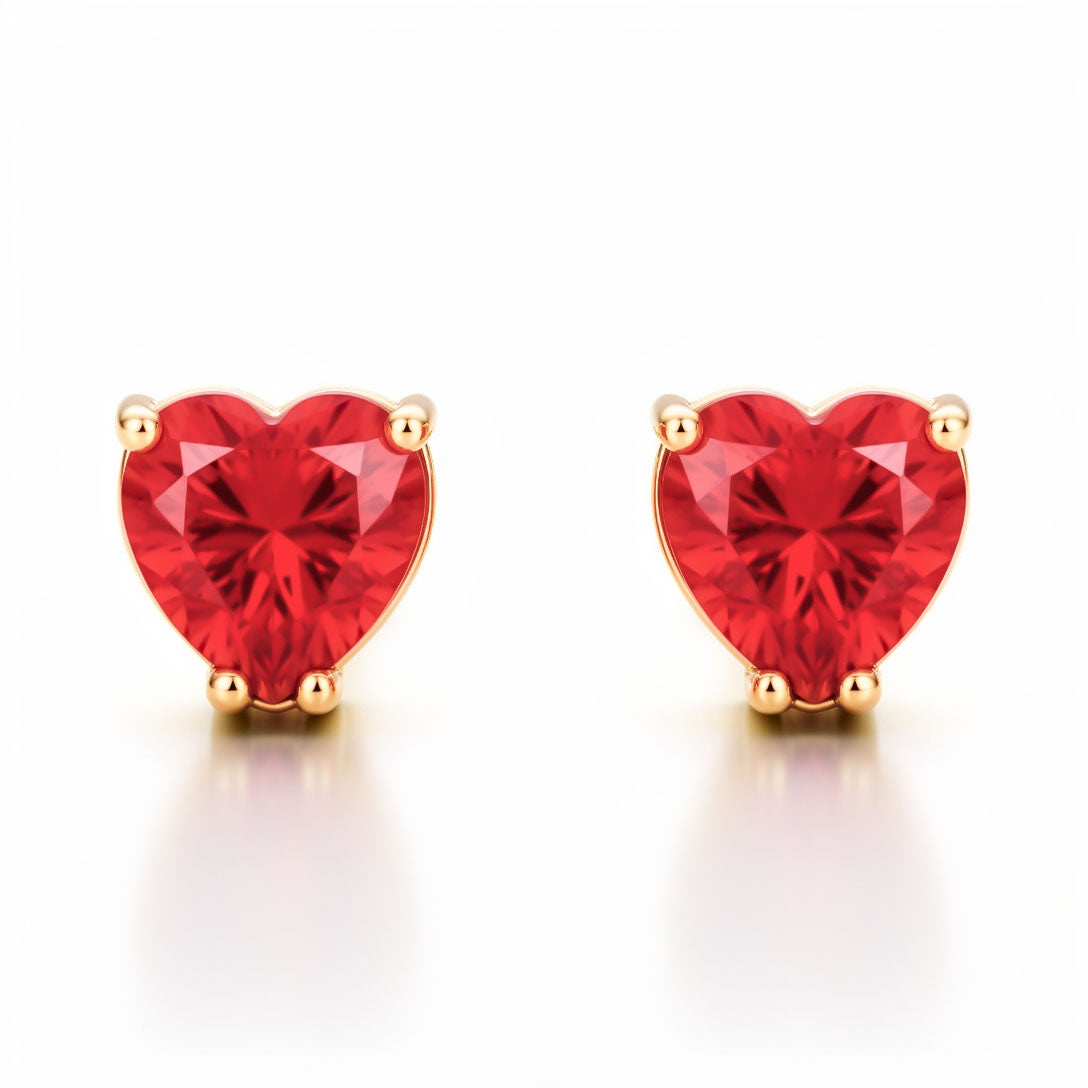 Red heart cubic zirconia studs in gold-plated claw settings