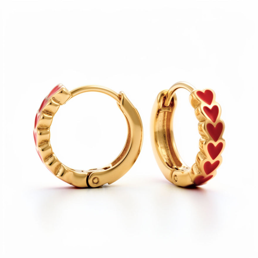 Huggie hoops with red enamel hearts