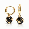 Pair of gold-plated crossover hoops with black cubic zirconia drops