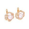 Gold | Gold-tone flower earrings with pearl and cubic zirconia, angled view