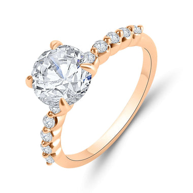 Round solitaire ring with side stones