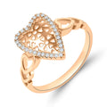 Heart filigree ring with a cubic zirconia border and a warm gold-tone finish