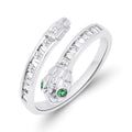 Open snake ring in platinum tone with white baguettes and green eyes