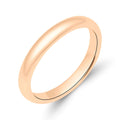 Narrow smooth ring with a warm gold-tone finish, angled view on white