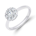 Silver-tone flower ring with a large central cubic zirconia and eight smaller stones