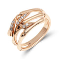Gold-tone ring with wavy leaf segments and tiny clear cubic zirconia