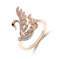 Gold-plated swan ring with wings covered in cubic zirconia