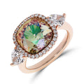 Evening ring with a large multicoloured cubic zirconia and a crown of white stones