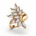 Ring with light blue marquise cubic zirconia in a branching fan