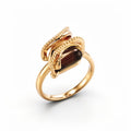 Ring with a smooth coffee-coloured cubic zirconia in a beaded gold-tone frame